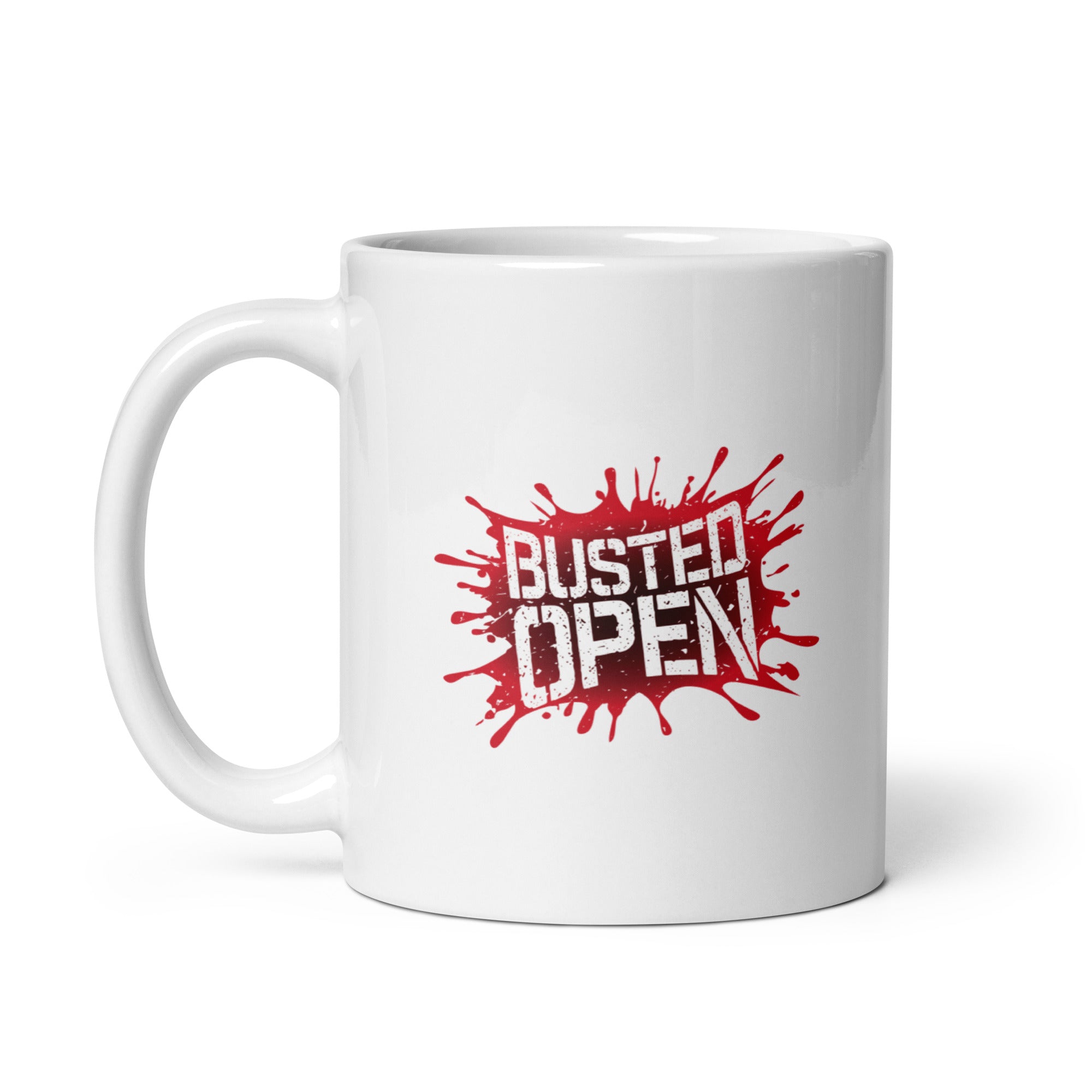 White mug with a red splatter design featuring the words 'BUSTED OPEN.'