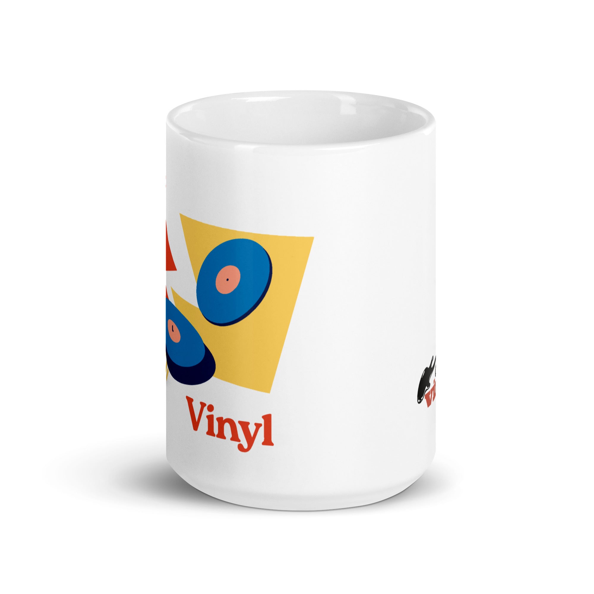 Front angled view of a larger white ceramic mug showing part of a colorful design with two blue vinyl records and red text reading 'Vinyl' below the image.
