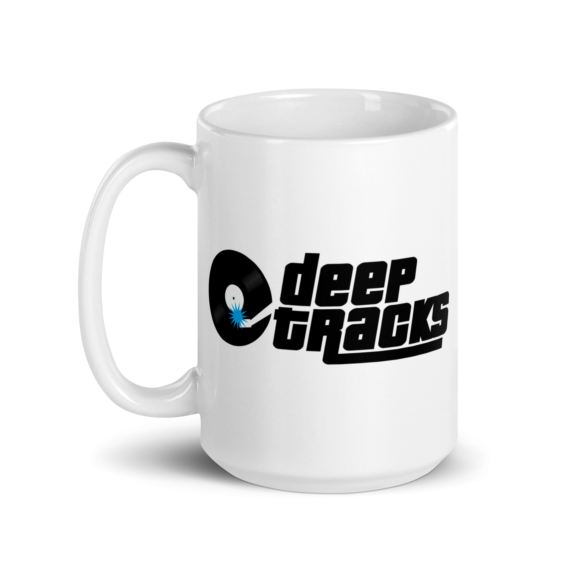 White mug featuring the logo 'deep TRACKS' with a vinyl record graphic.