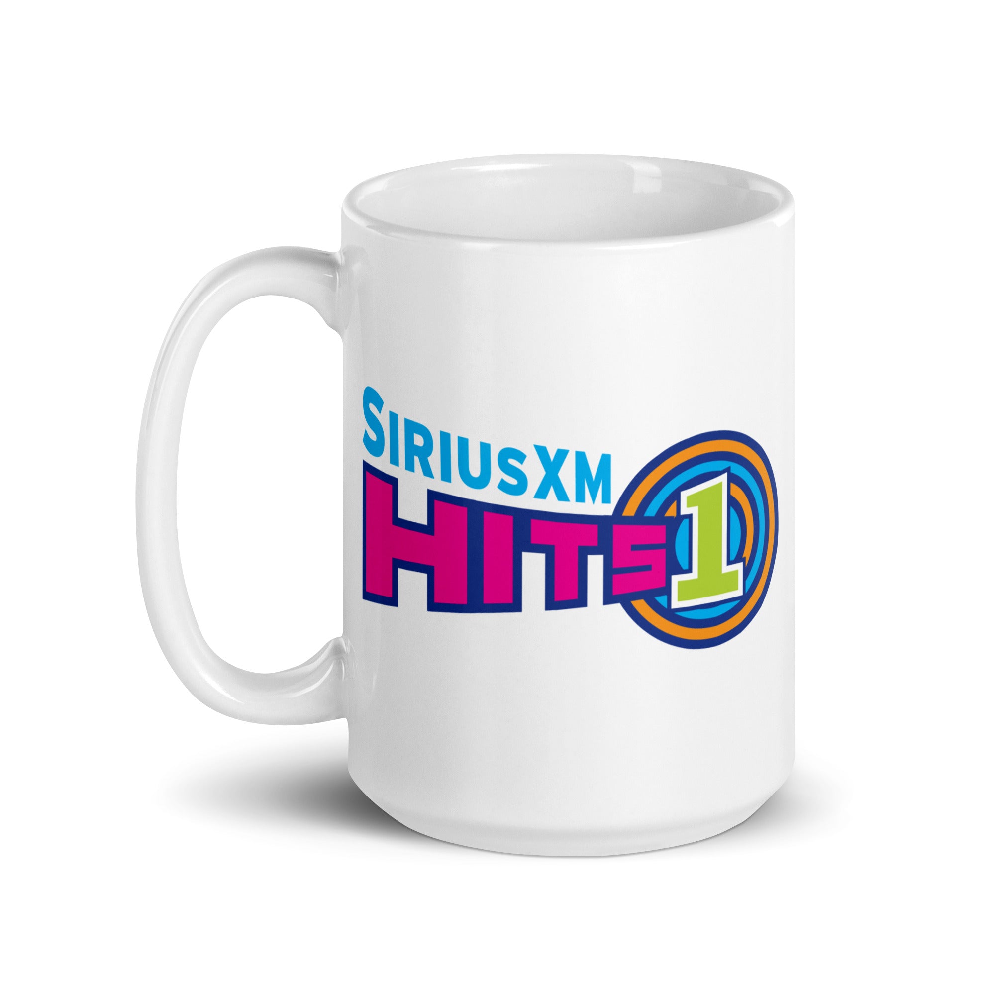 A white coffee mug featuring the 'SiriusXM Hits 1' logo in vibrant colors. Colors include pink, purple, orange and vivid green.