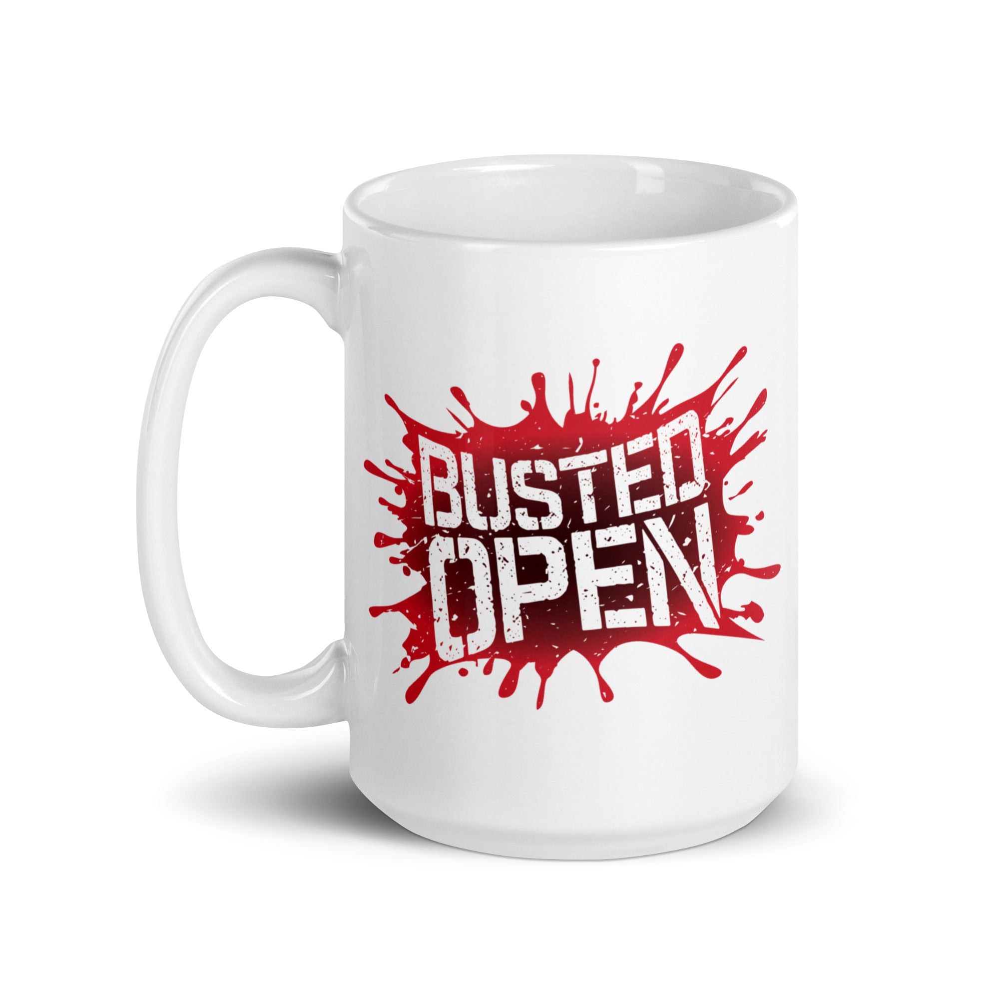 White mug with a red splash design featuring the text 'BUSTED OPEN' in bold, distressed lettering.