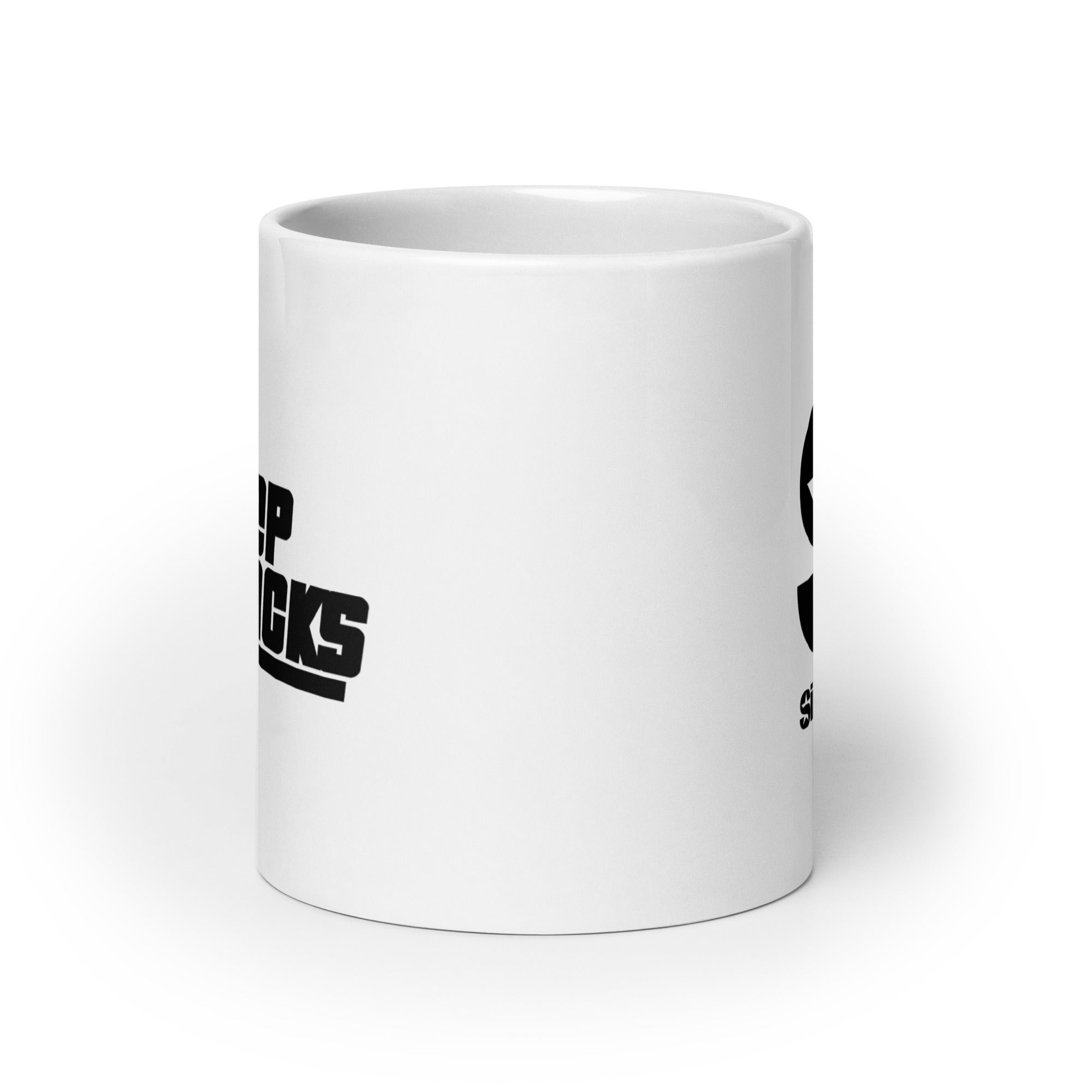 Side view of white ceramic mug, with partially visible front and back logos.