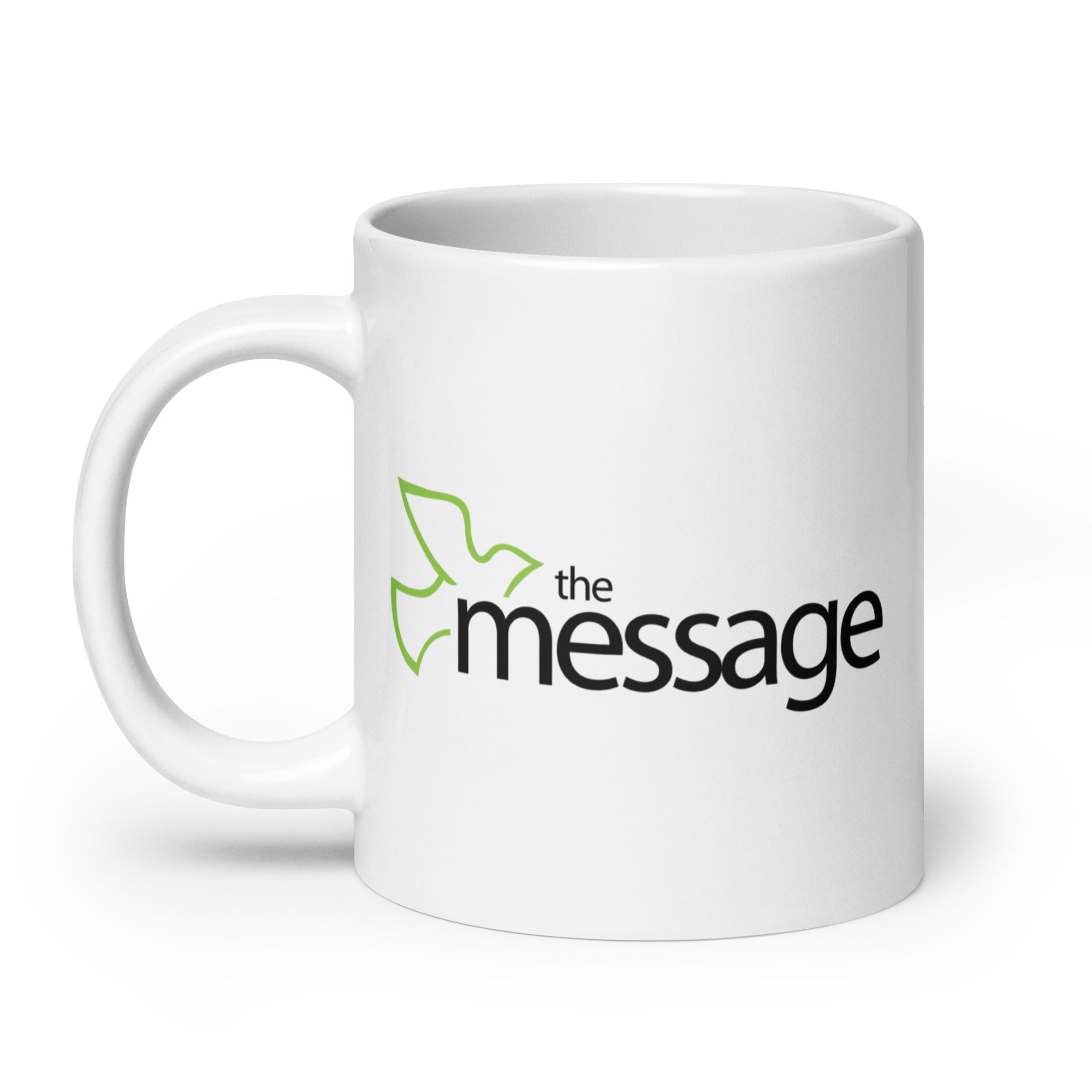 White mug featuring the phrase 'the message' with a green bird design.