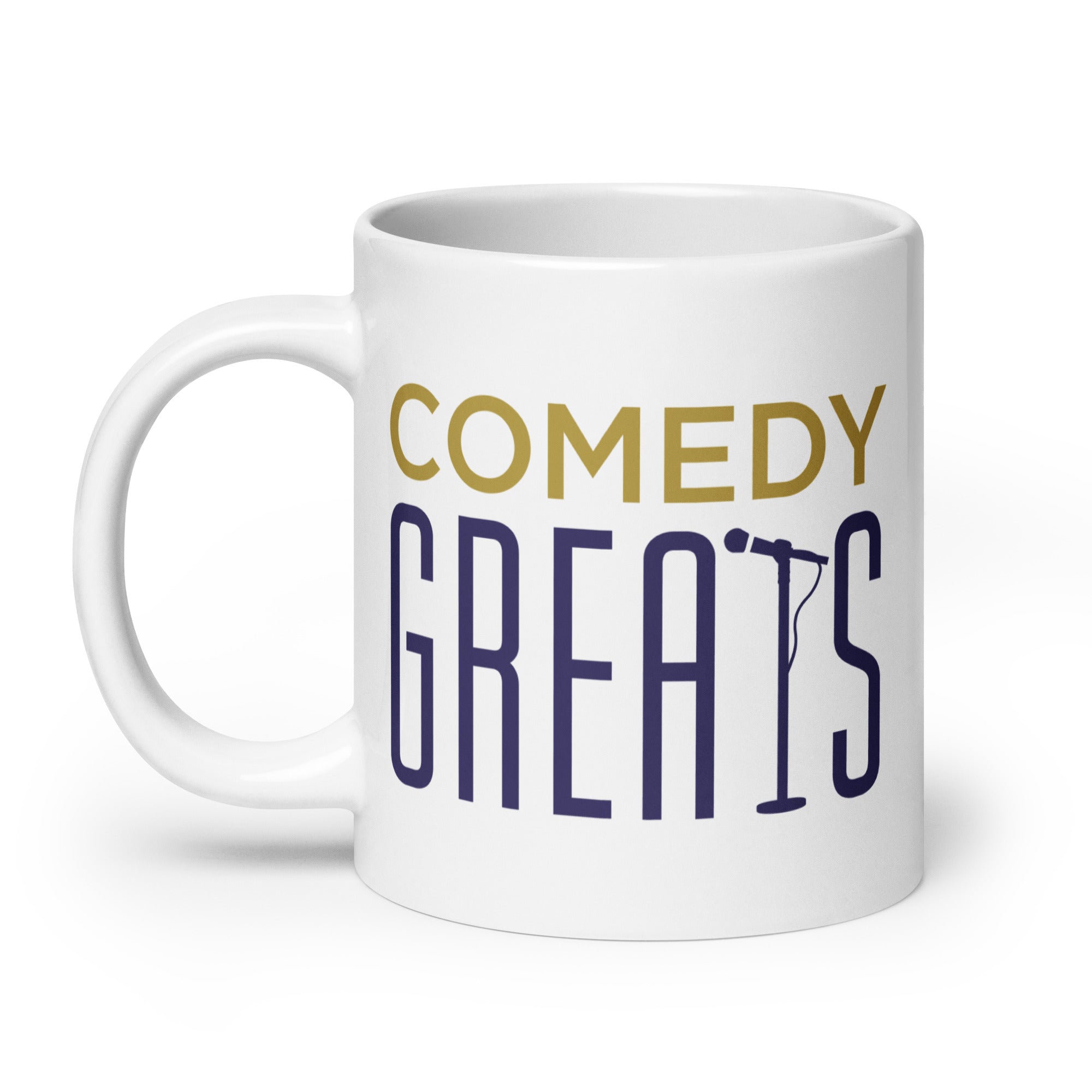 White mug with the words 'COMEDY GREATS' in yellow and purple and a microphone graphic.