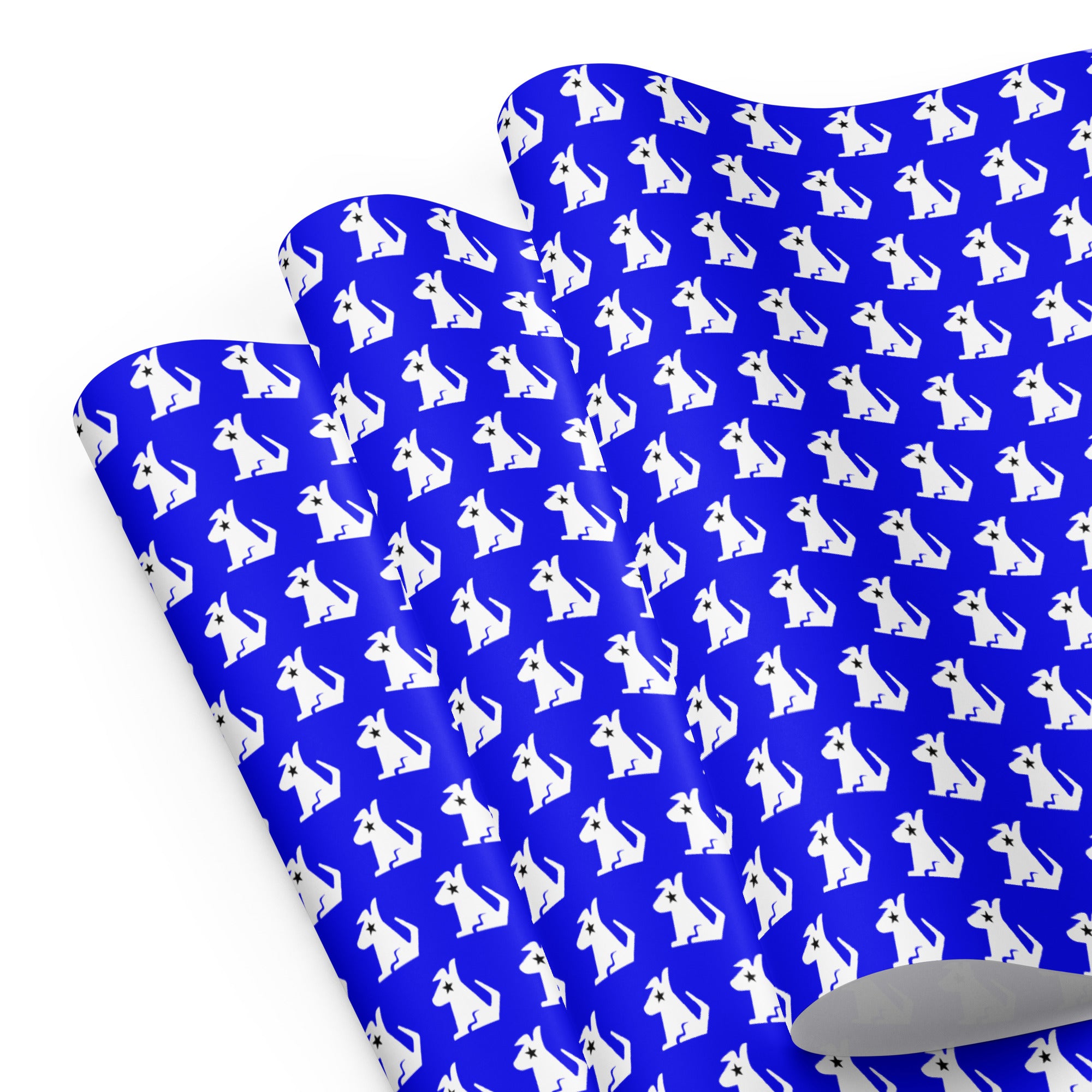 Wrapping paper featuring a blue background with repeating white dog silhouettes.