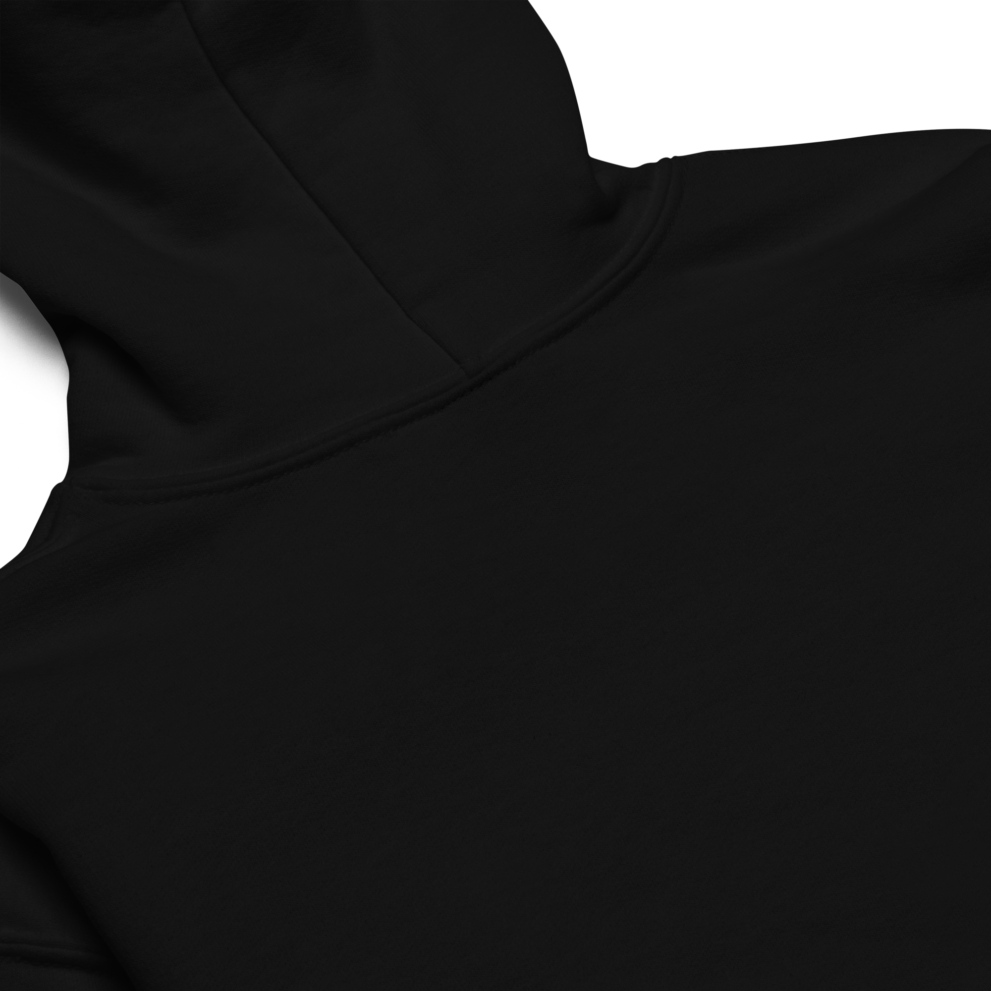 Close-up of the back of a black hoodie against a black background.